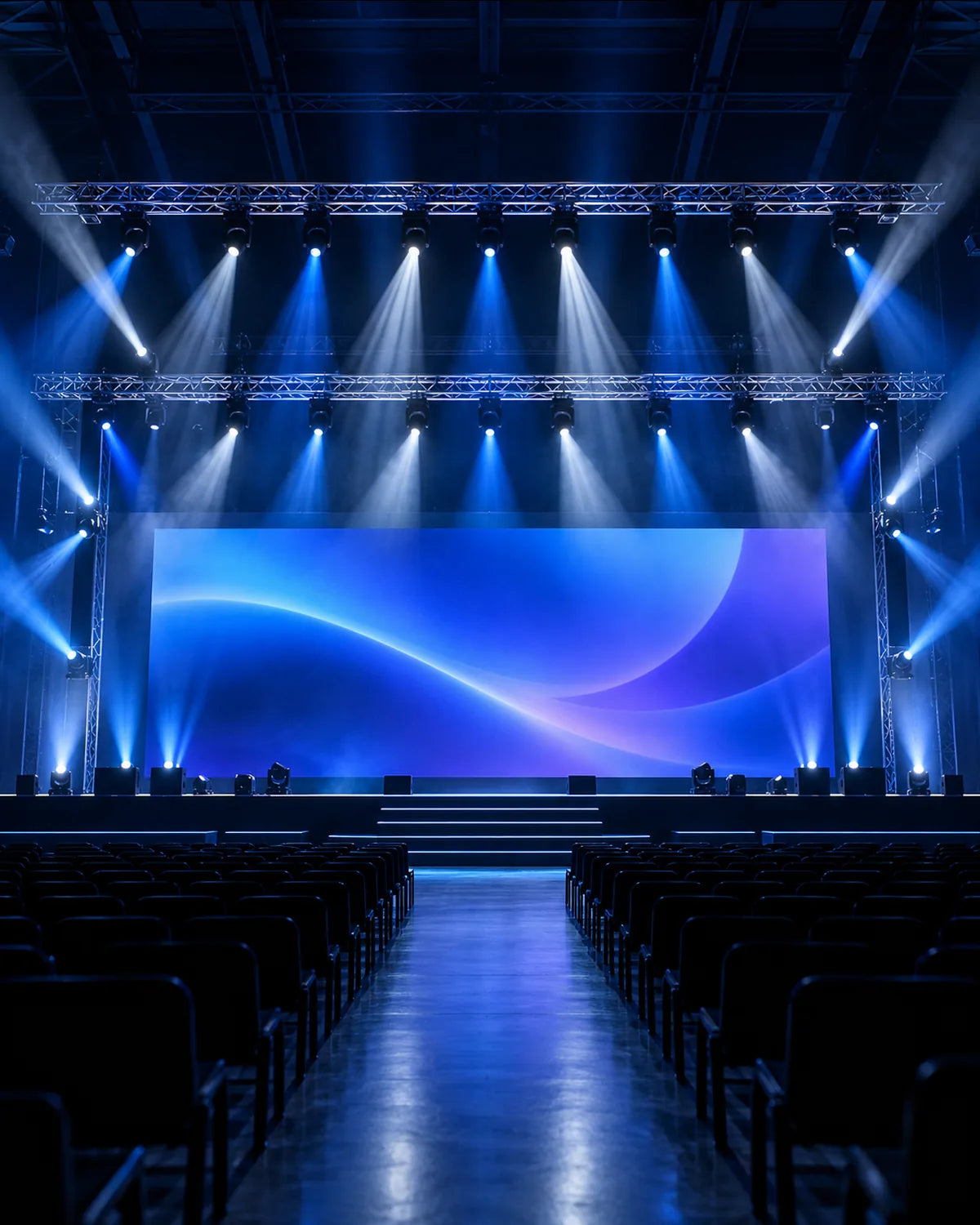 Event stage with moving head lights on truss and a large LED video wall
